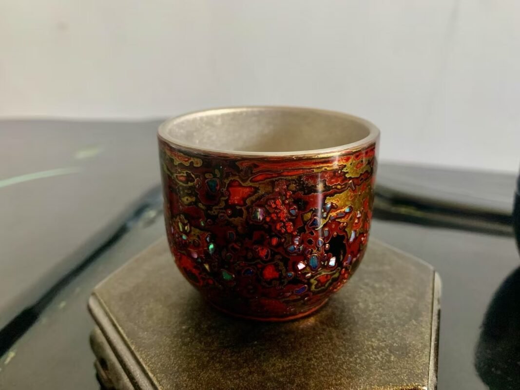 A cherished handmade tea vessel resting in its familiar place after years of everyday use