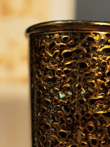 handcrafted oriental tea cup with detailed texture used in daily ritual