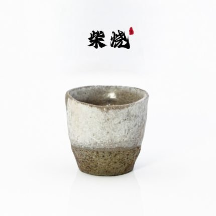 wood-fired shino slip tall teacup front view