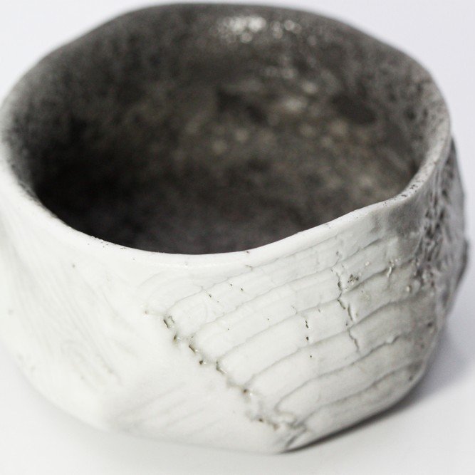 Wood-Fired Jade-Porcelain Teacup 3 flowing texture porcelain surface
