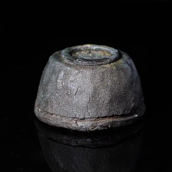 Hand-Pinched Wood-Fired “Sun & Moon” Cup 4 woven exterior grain wood-fired texture