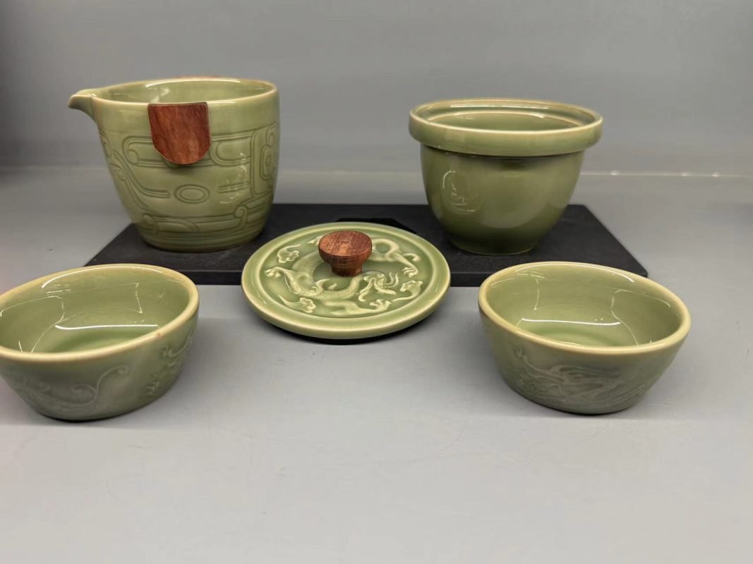 Chinese dragon motif Yaozhou celadon engraved relief detail