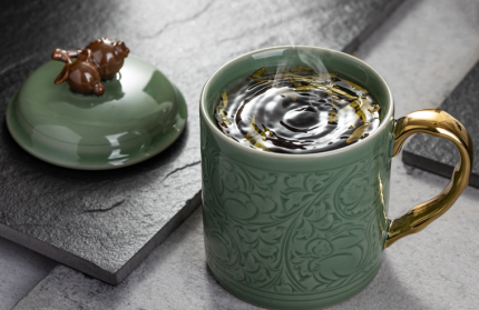 Qinling four treasures motif Yaozhou celadon mug