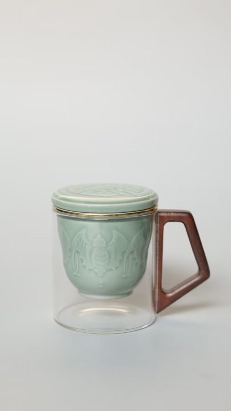 Yaozhou celadon five bats relief tea cup with glass body