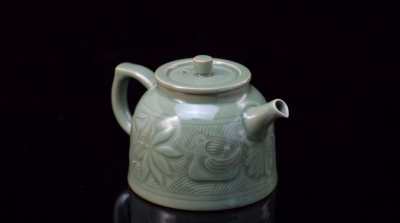 Yaozhou ware celadon is known for its muted, olive-toned glaze rather than vivid green.