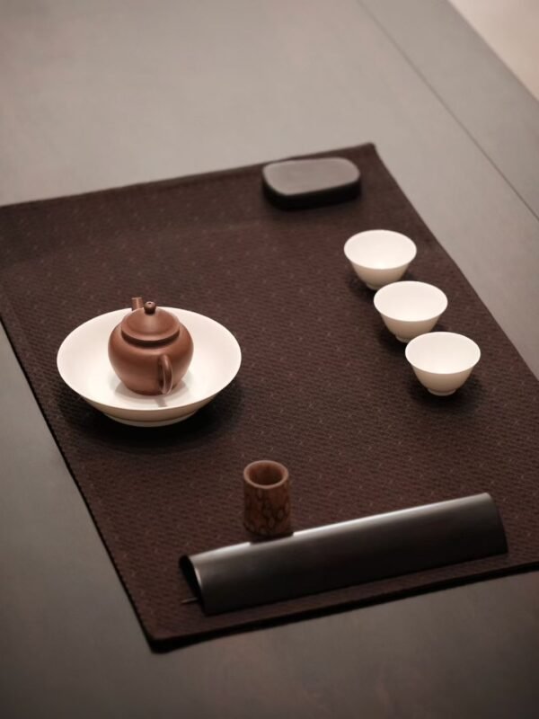 Repetitive tea preparation gestures showing structured ritual behavior and reduced cognitive decision load