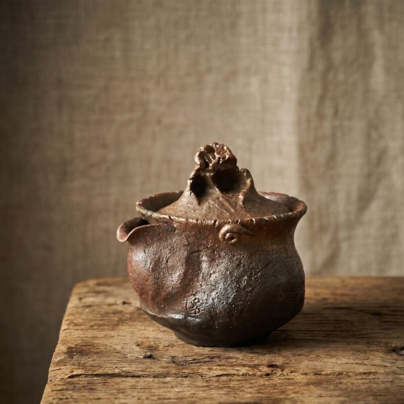 Close detail of handmade ceramic texture and uneven glaze