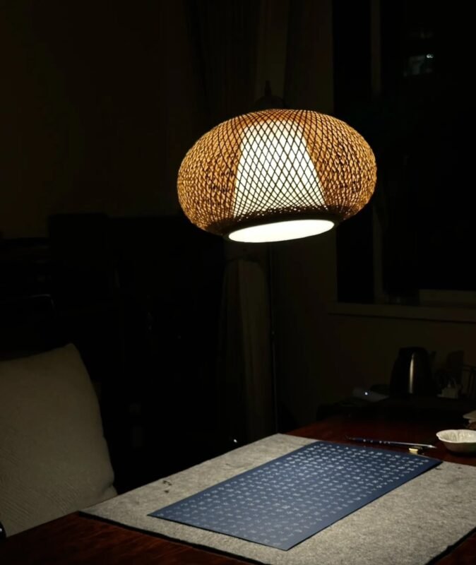 Quiet scholar desk at night with tea and handwritten paper