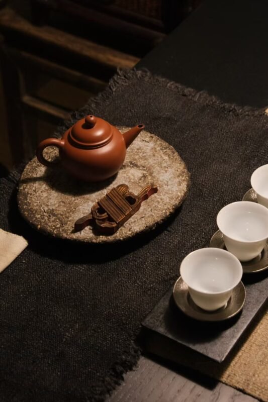Old tea bowl in soft night light creating emotional atmosphere