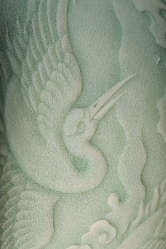 Close detail of celadon glaze with soft green tones