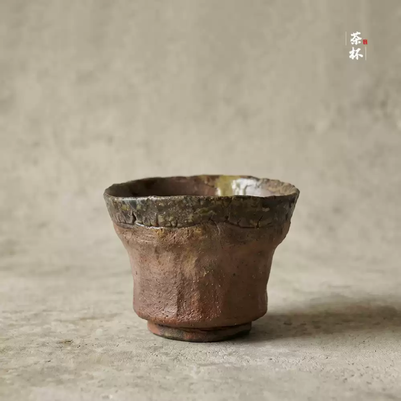 Close detail of uneven glaze and handmade ceramic texture