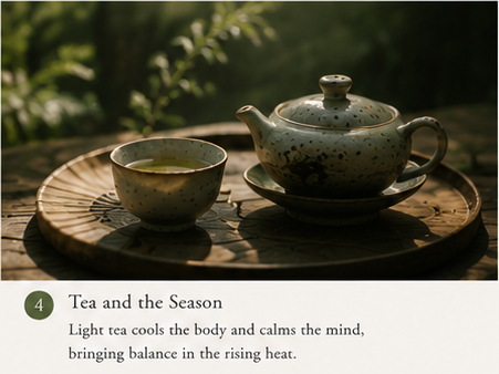 handmade Chinese teaware with light tea served in a calm summer environment